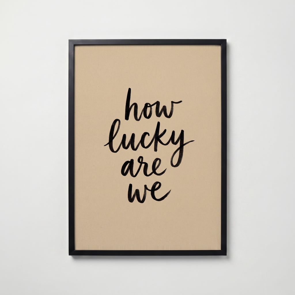 How Lucky Are We Poster – svart ram